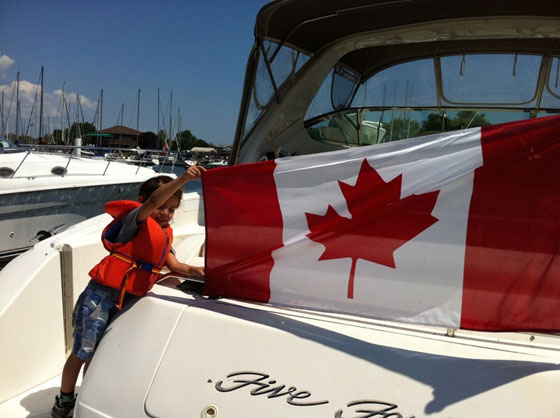 Boat Flying the Canadian Flag