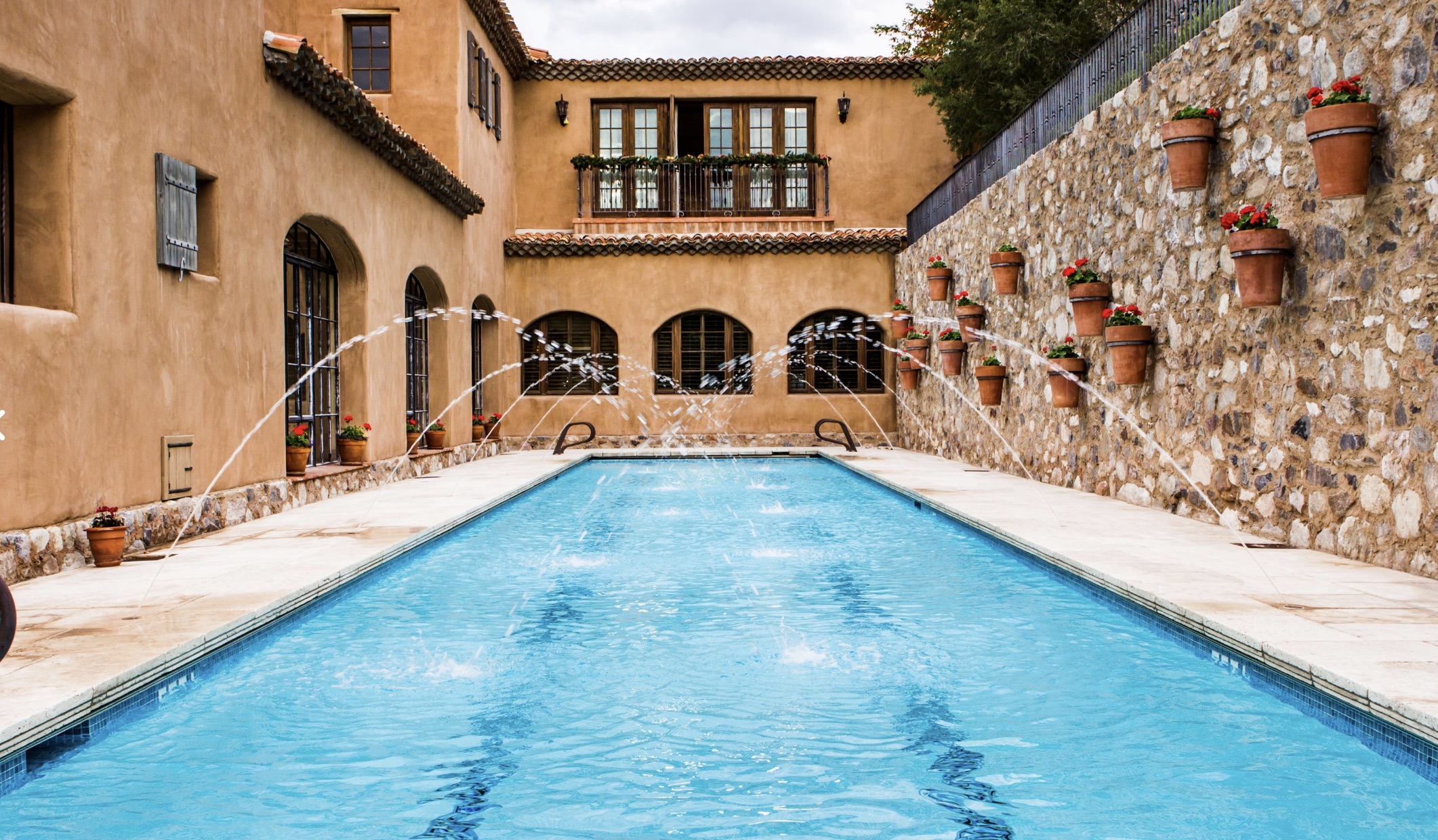 Fountain-lined resort pool at the Silverleaf Club